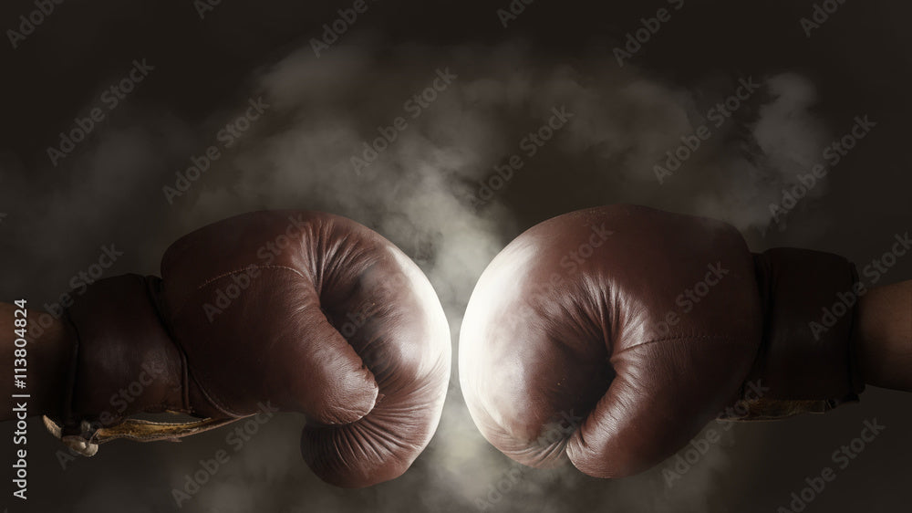 Mastering Defensive Maneuvers in Boxing: Head Movement and Guard Techniques