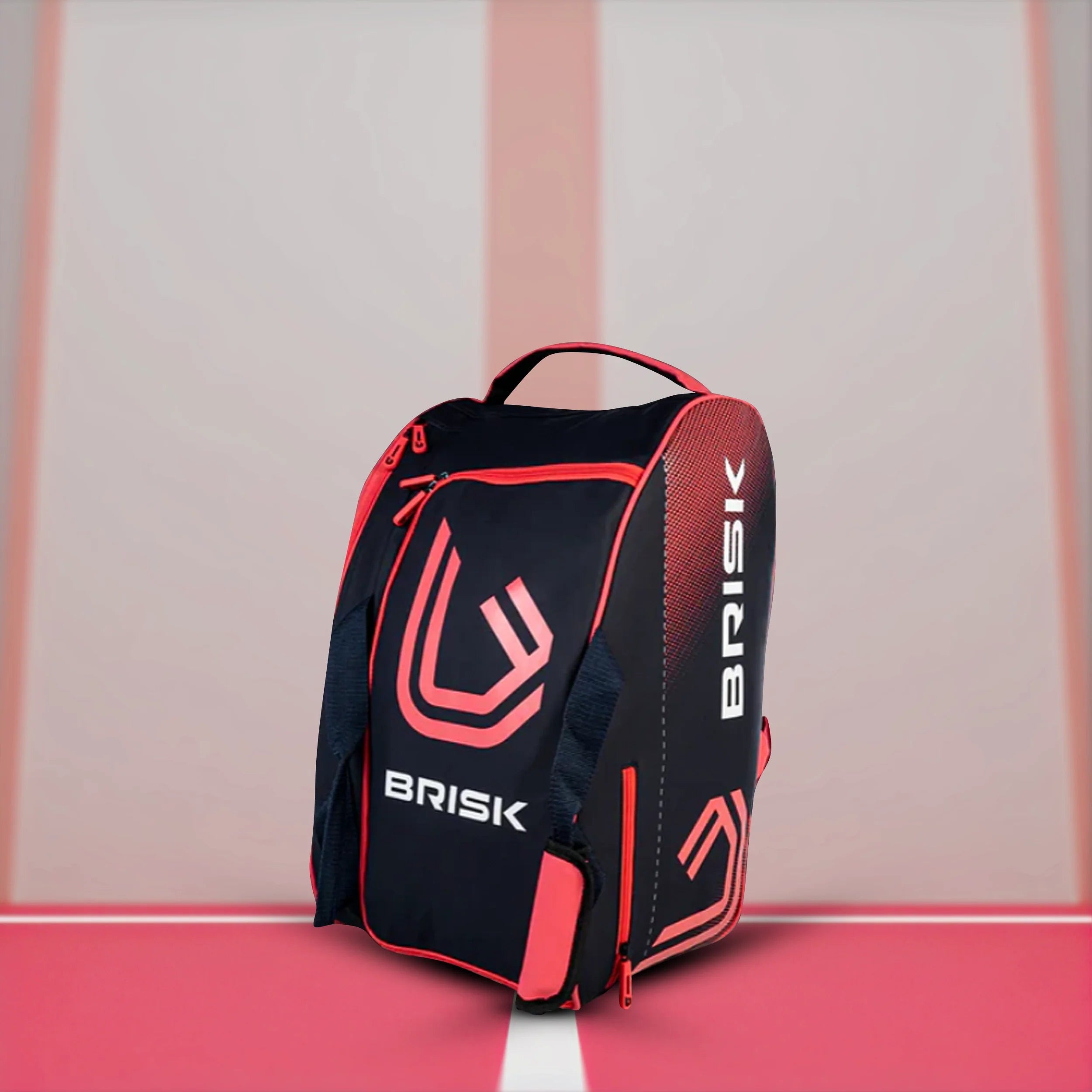 A player holding a stylish padel racquet bag on the court.