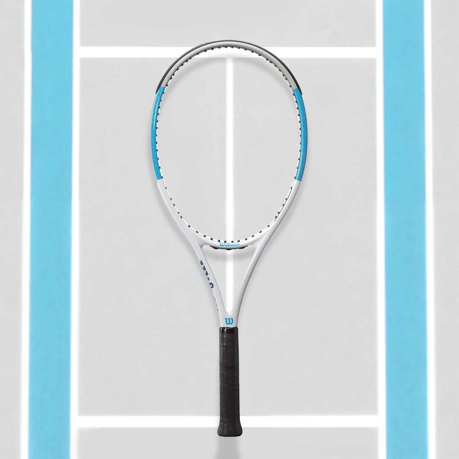 A coach recommending the Wilson Ultra Power Team 103 Tennis Racquet for athletes.