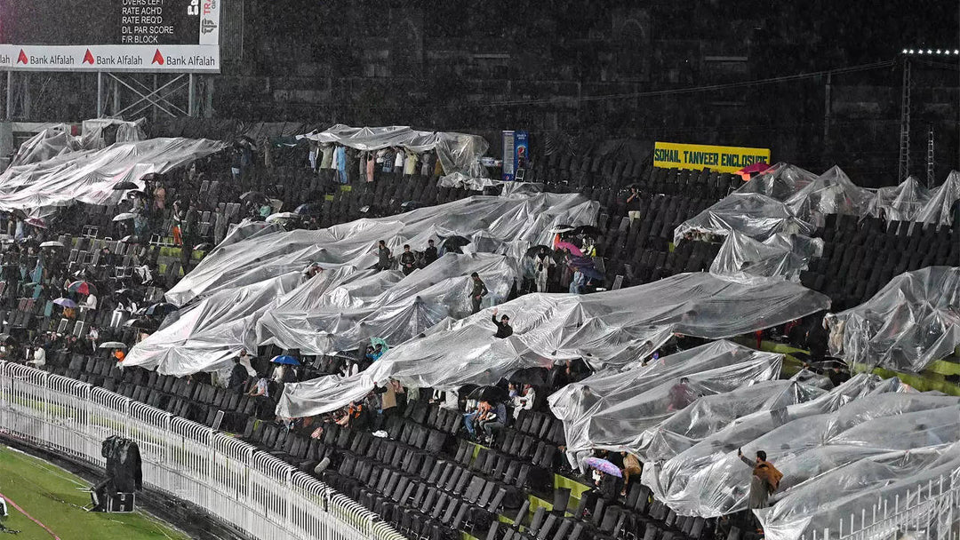 Pakistan Cricket Fans Drenched in Rain Delay at Pindi Stadium