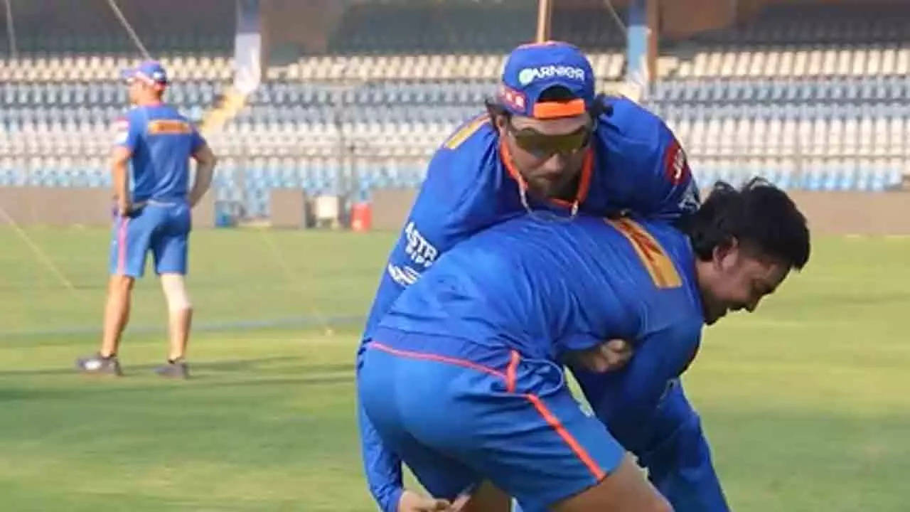 Mumbai Indians' Ishan Kishan Takes on Towering Daniel Sams in Playful 'David vs Goliath' Moment