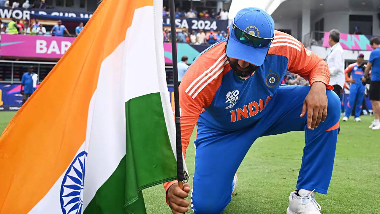 Rohit Sharma's Iconic Flag Hoisting Moment Captures India's T20 World Cup Triumph