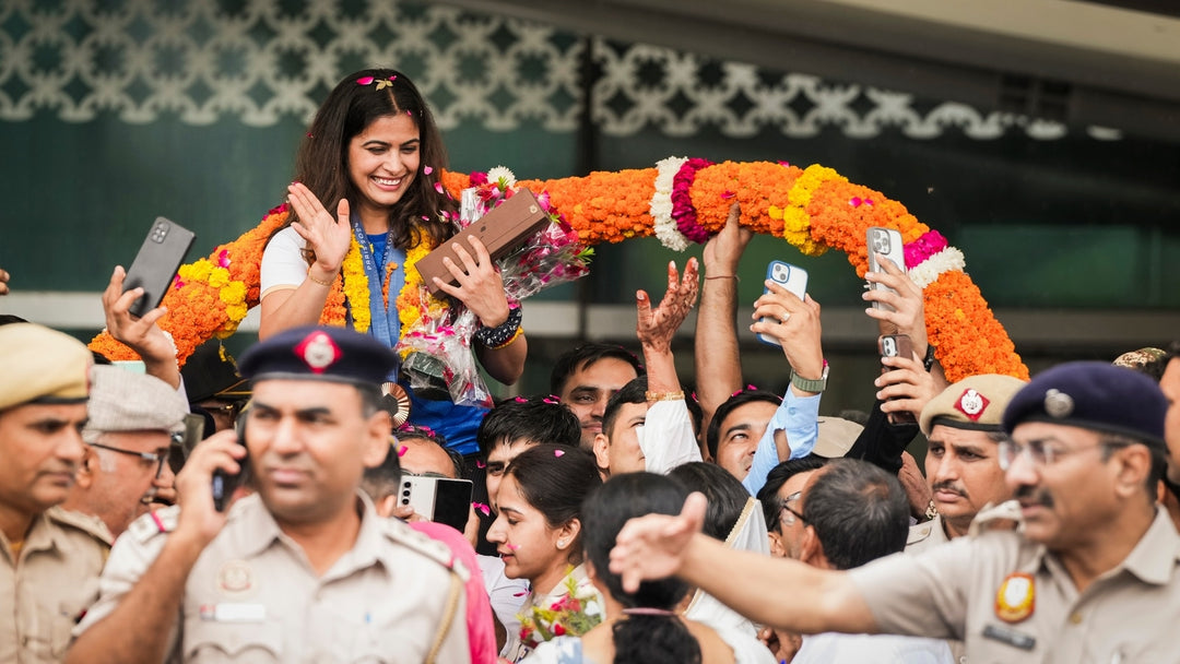 Manu Bhaker Returns Home as Olympic Medalist, Receives Grand Welcome