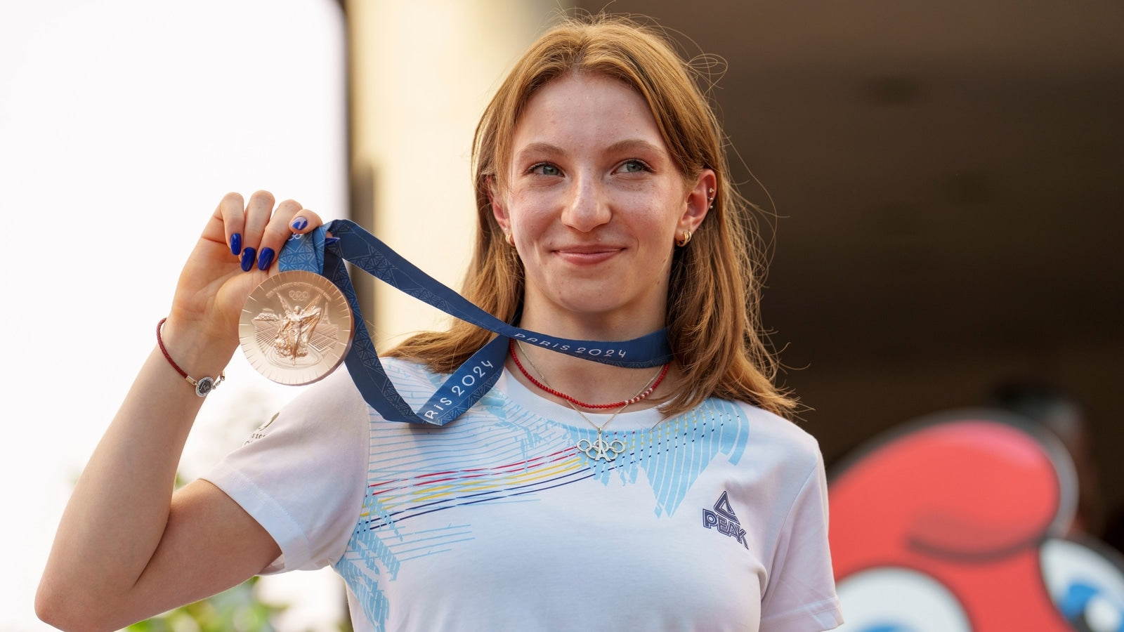 Romanian Gymnast Bărbosu Shows Empathy for Chiles in Medal Controversy