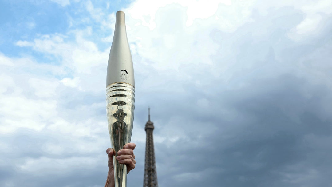 Olympic Torch Illuminates Paris, Uniting City in Celebration