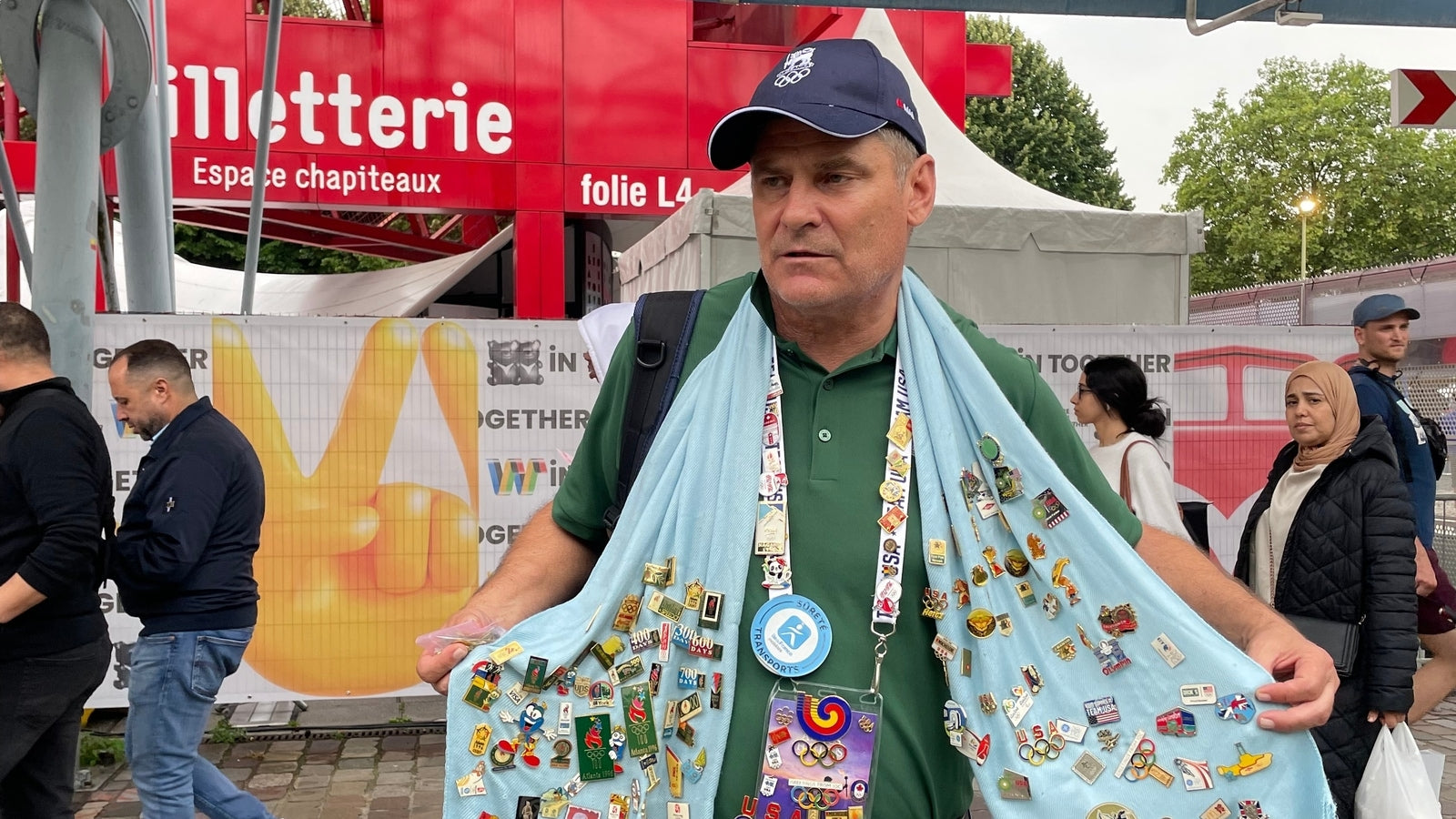 Olympic Pin Enthusiast Embraces Paris Games with Trading and National Hospitality