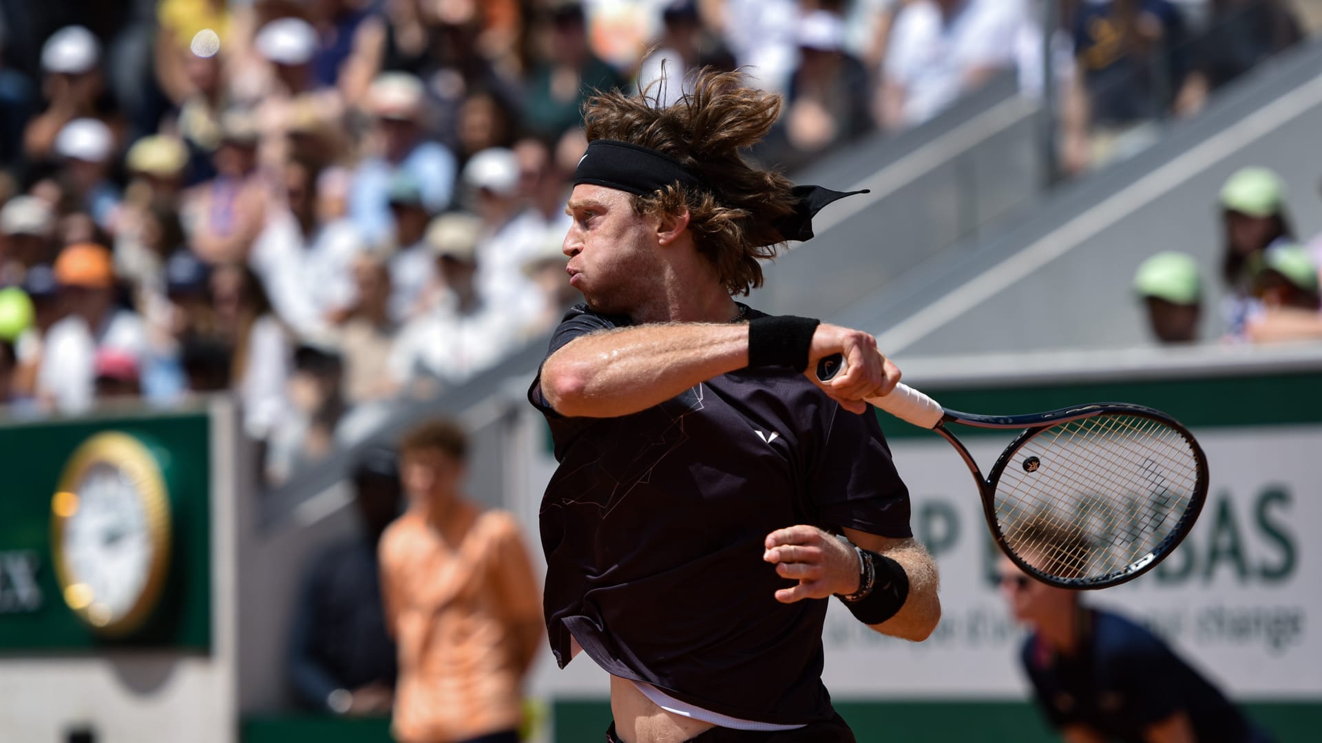 Rublev Survives Scare to Advance at Roland Garros