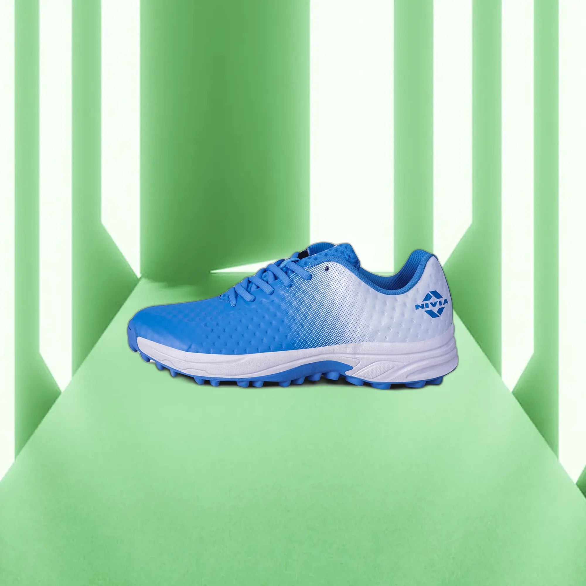 Nivia_Crick_1000_2_Cricket_Shoes_Blue_Nautical_Blue_Main2_InstaSport