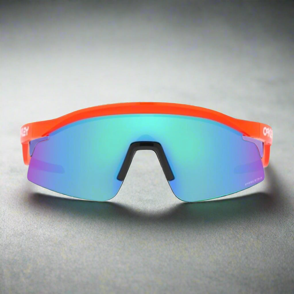 Oakley_HydraSunglass_NeonOrange_PrizmSapphire_Frontview_Instasport