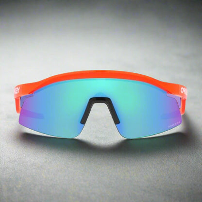 Oakley_HydraSunglass_NeonOrange_PrizmSapphire_Frontview_Instasport