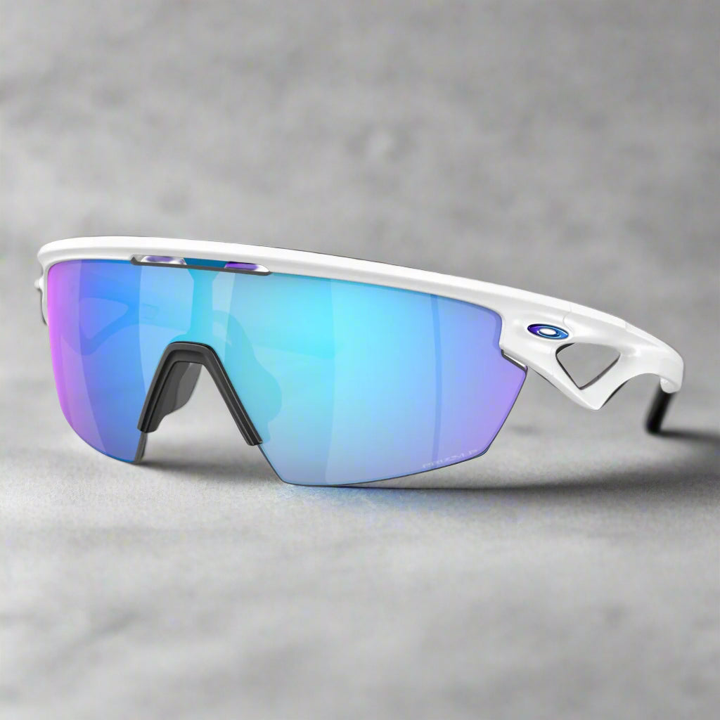 Oakley_Sphaera_Sunglass_WhitePrizmSapphire_PolarizedLens_Sideview_Instasport