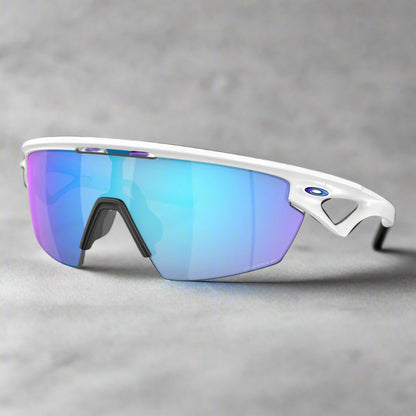 Oakley_Sphaera_Sunglass_WhitePrizmSapphire_PolarizedLens_Sideview_Instasport