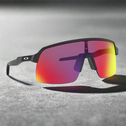 Oakley_Sutrolite_Sunglass_MatteBlack_Prizm_RoadLens_FrontSide_Instasport