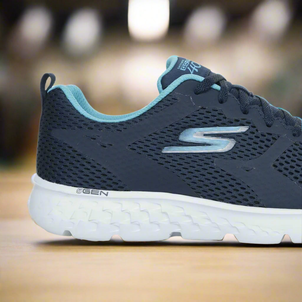 Skechers_896328ID-NVAQ_SportsShoes_Back_Instasport